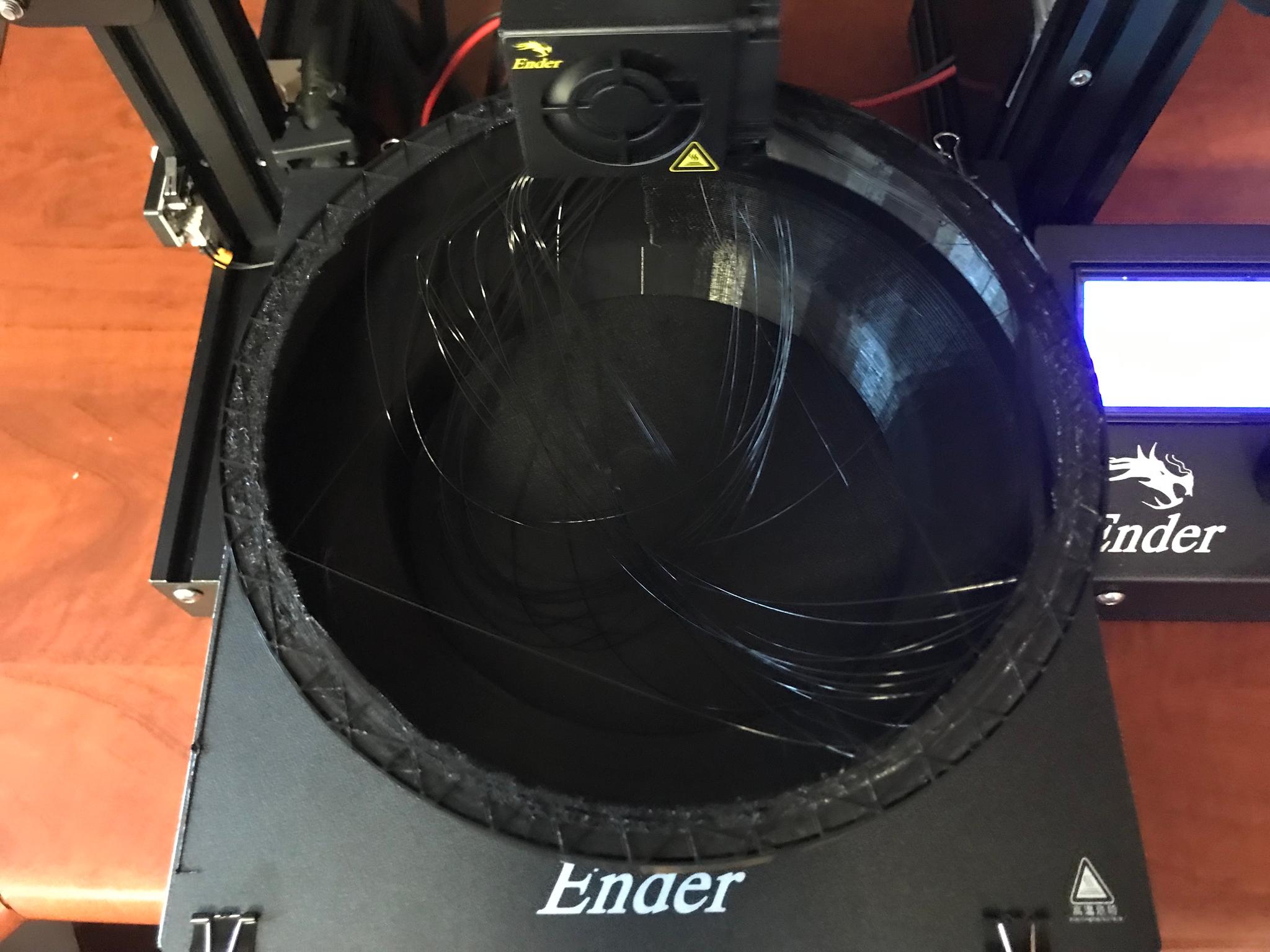 Stringy filament encountered during printing process.