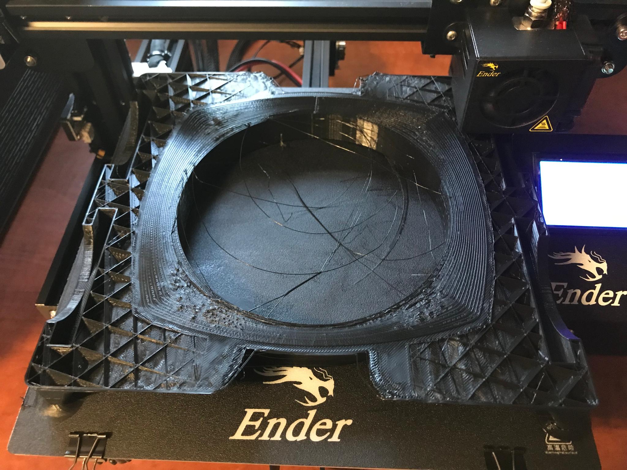 Defects already present during lower portion of print.