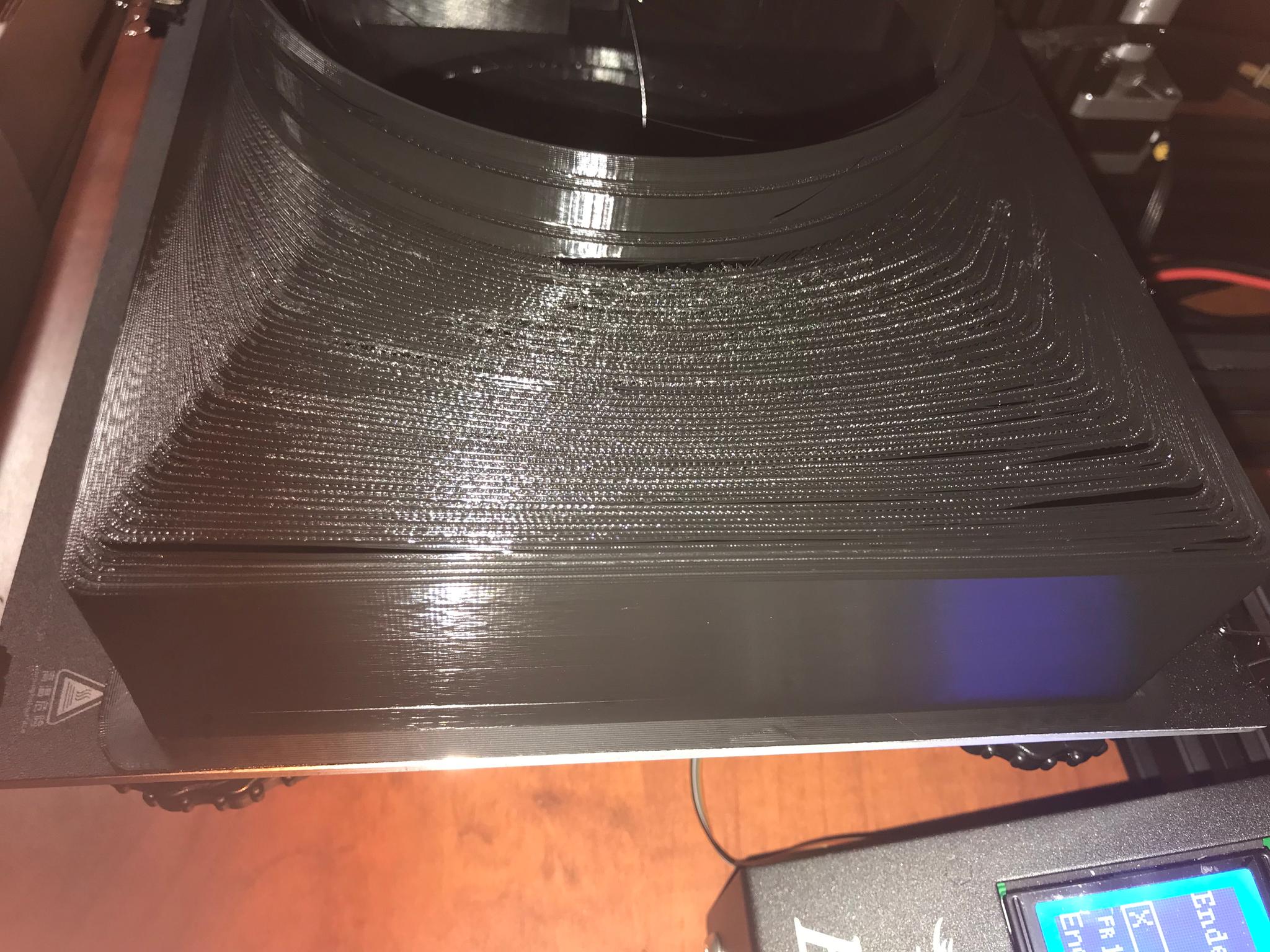 View of defects in funnel portion of print.